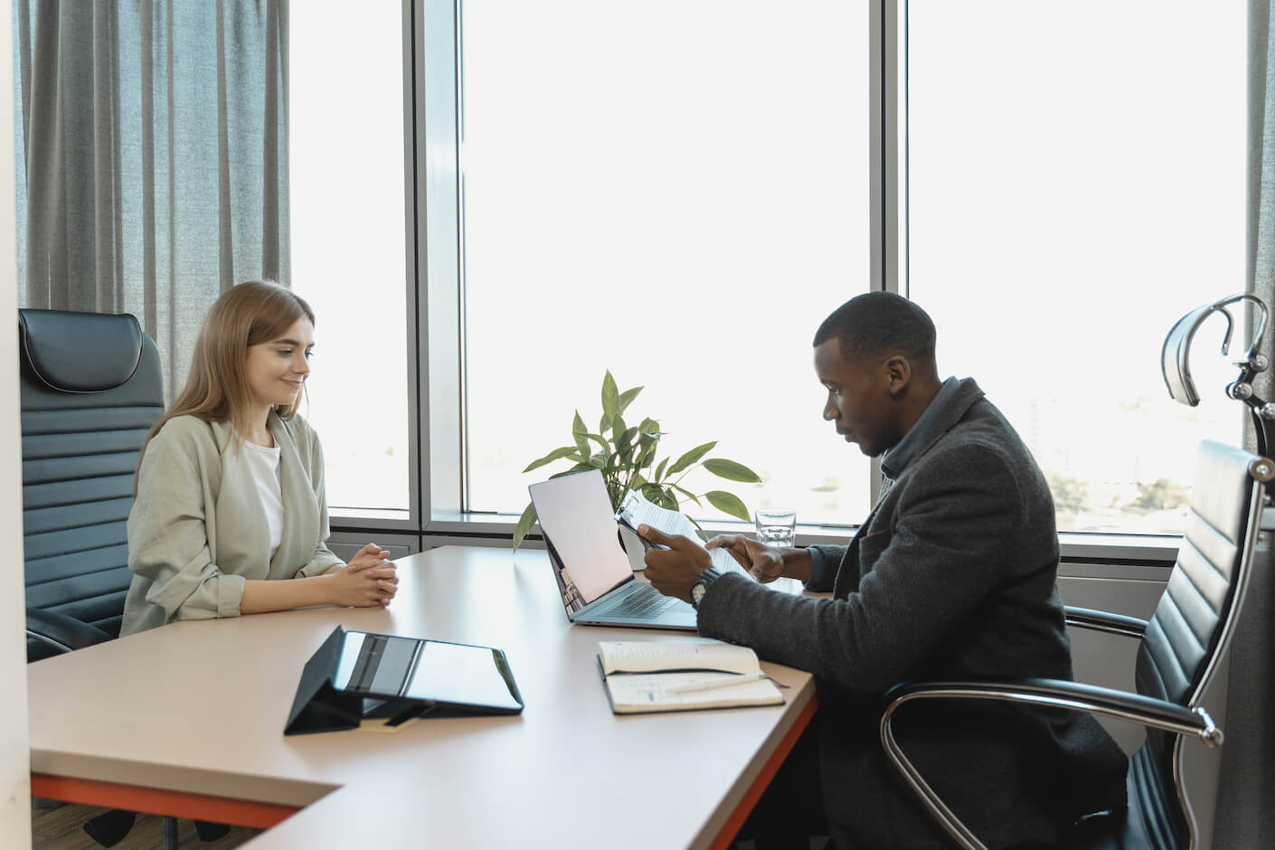 Two people at desk